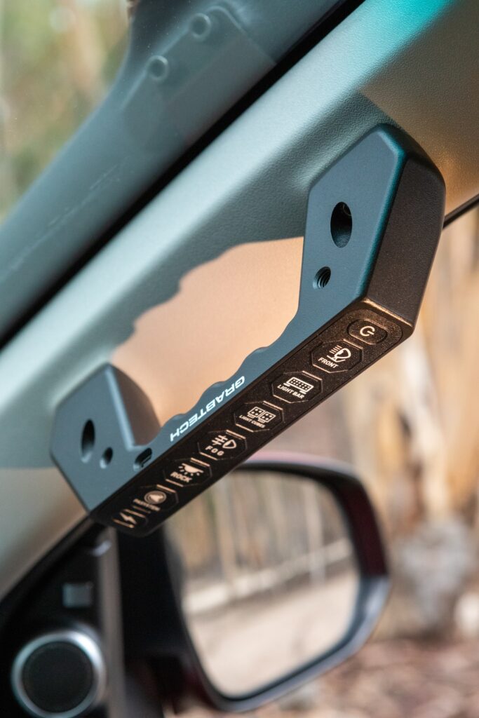 4WD grab handle accessory switch for a clean interior installation